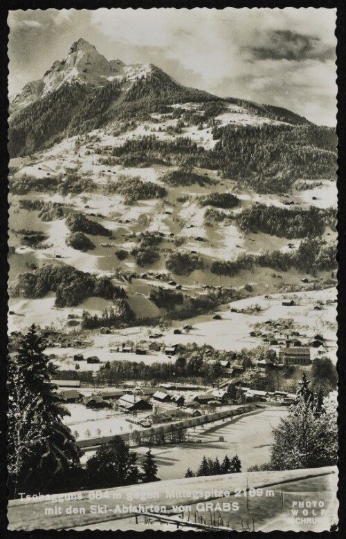 Tschagguns 684 m gegen Mittagspitze 2169 m mit den Ski-Abfahrten von Grabs